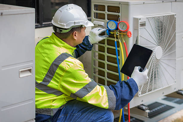 Professional Air Conditioning Repair technician working in Spanaway, WA